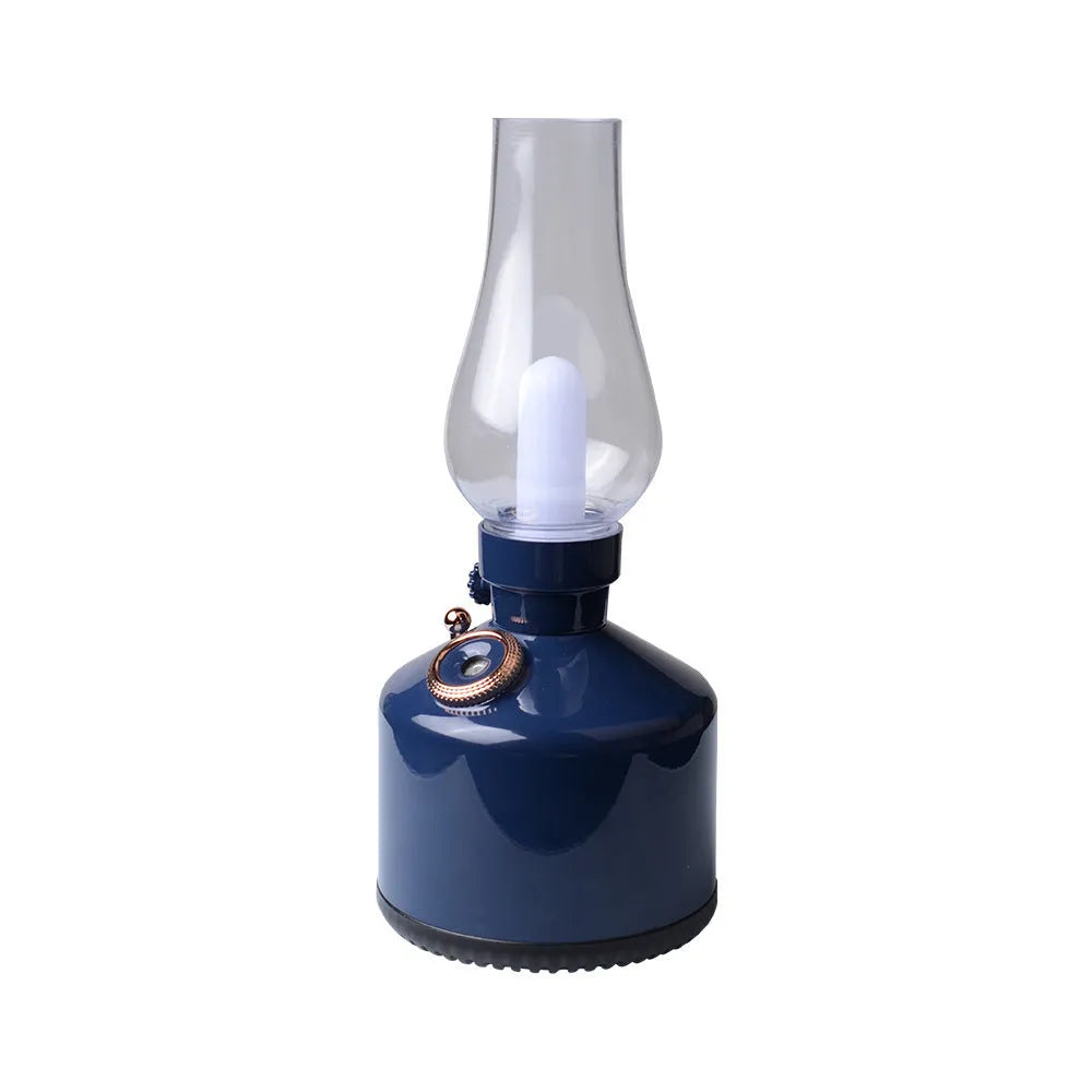 Kerosene lamp ultrasonic humidifier in brass colour with single fog outlet on wooden desk
