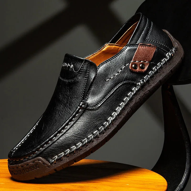 Men's leather casual shoes in black with round toe, shallow opening, and rubber sole
