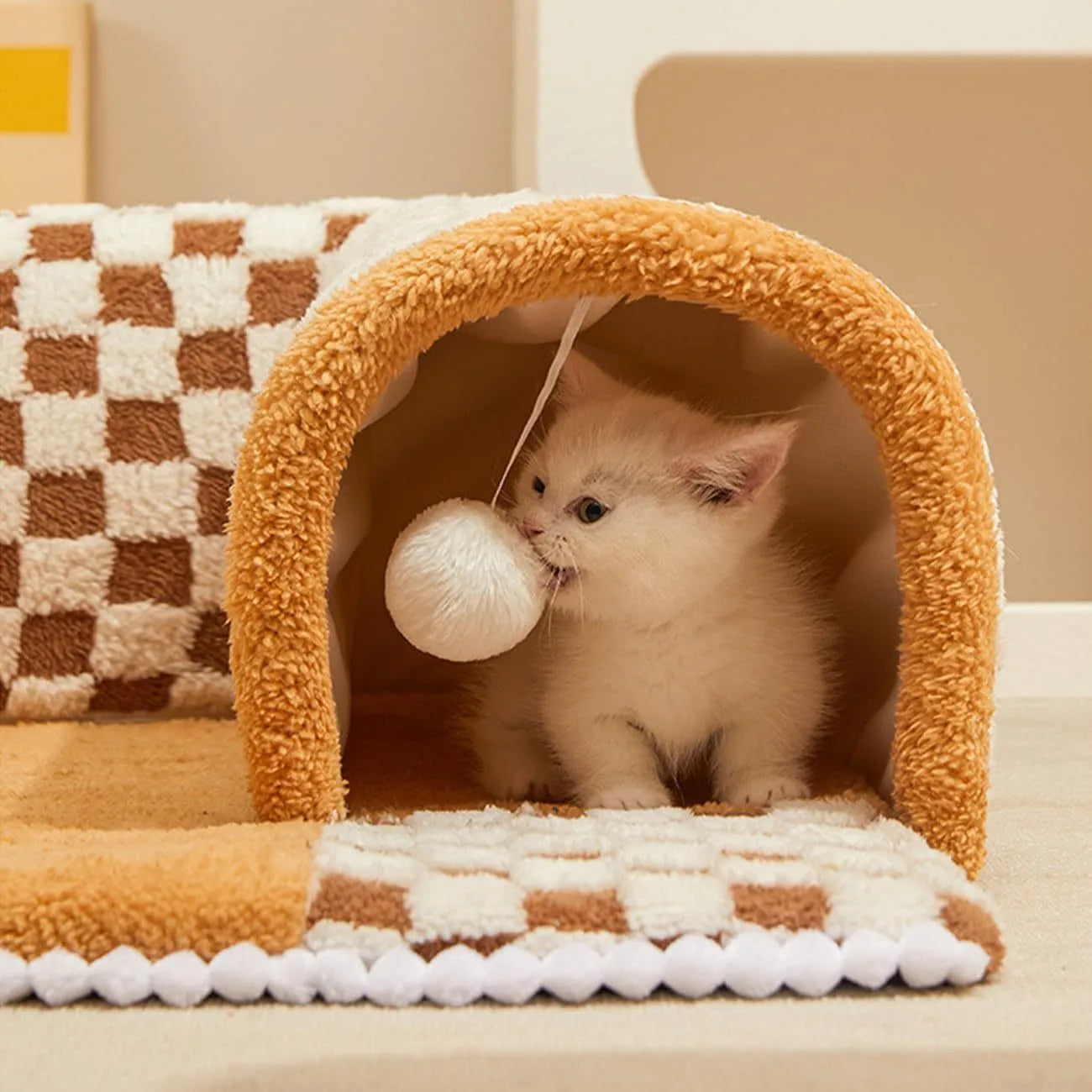 Coffee-colour fan-shaped plush pet bed tunnel for dogs and cats with a thick padded mat and anti-slip base.