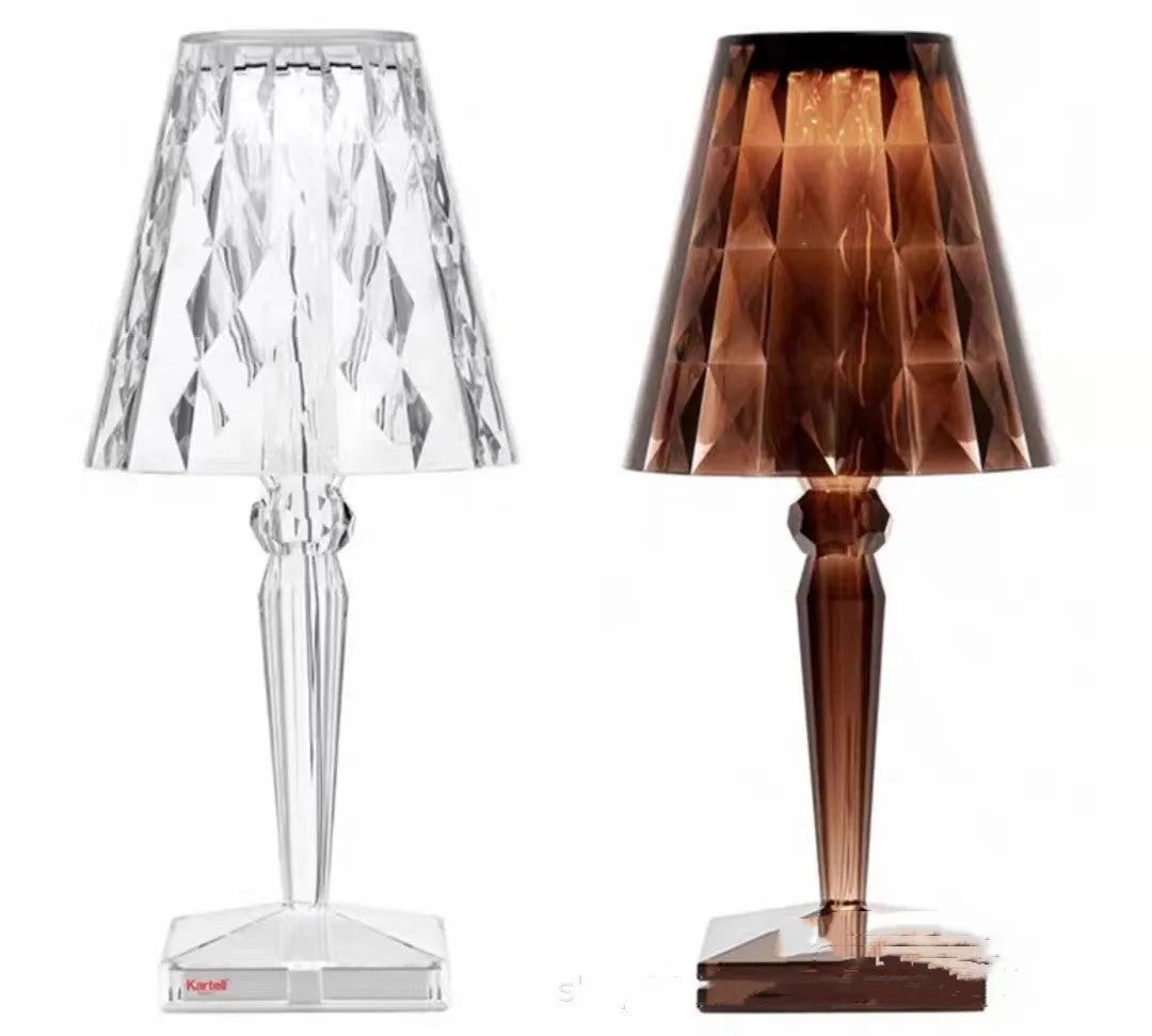 Rose gold plated portable touch night light with rechargeable battery on a table.