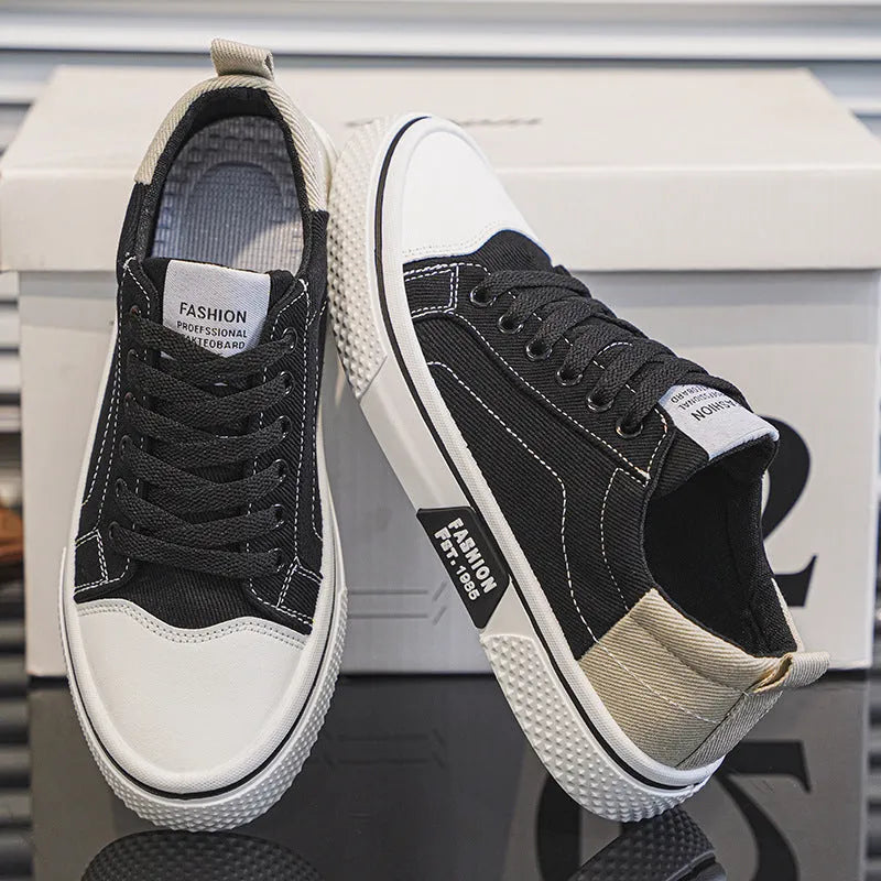 Men's blue canvas casual skateboarding shoes with round toe and lace-up front