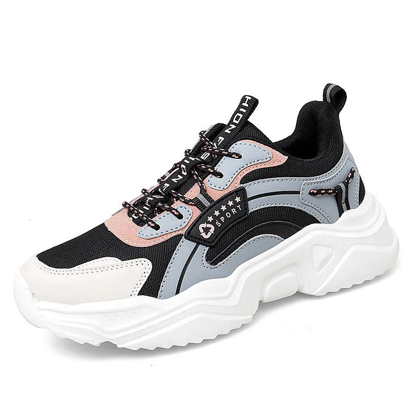 White women's thick-soled casual trainers with mesh upper and buckle detail