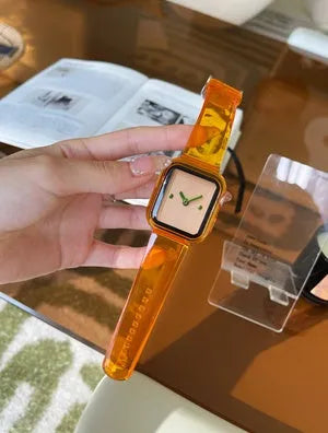 Brown transparent silicone Apple Watch strap showing clear construction and band attachment mechanism