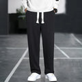 Casual grey men's sports trousers with multiple pockets and a high-waist design.