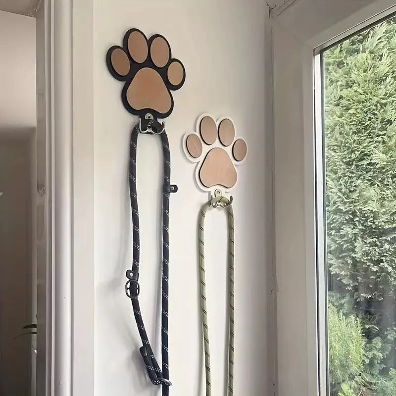 Black and white wooden paw print silhouette wall hook with 3-5kg load capacity for coats and keys