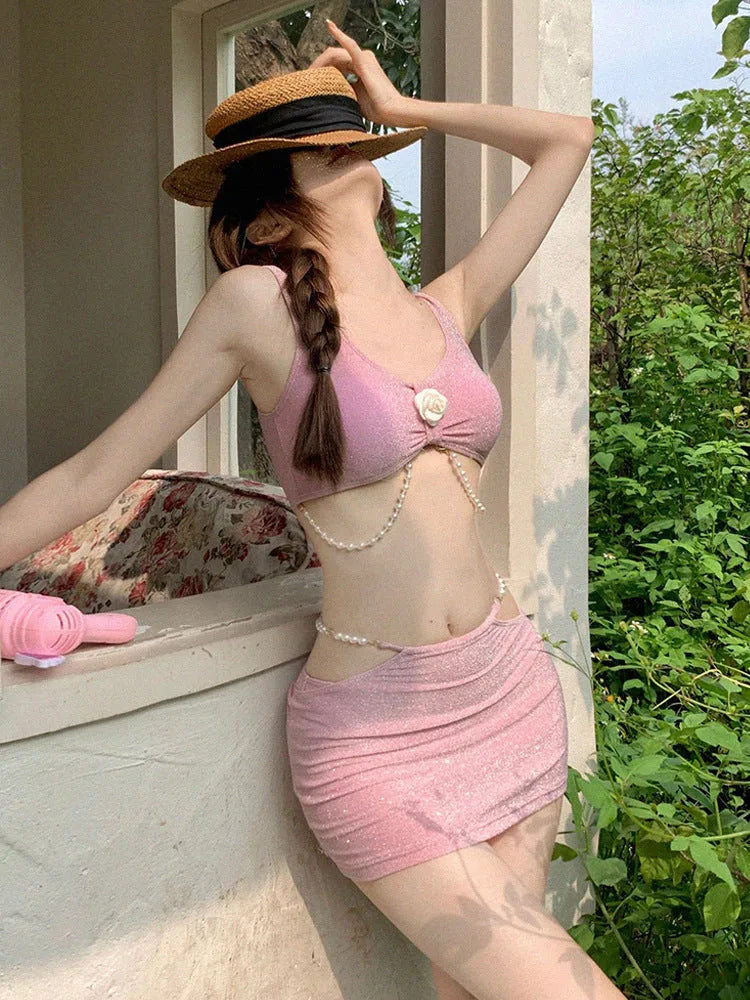 Bear Vacation women's three-piece bikini set in pink or black for swimming and hot springs.