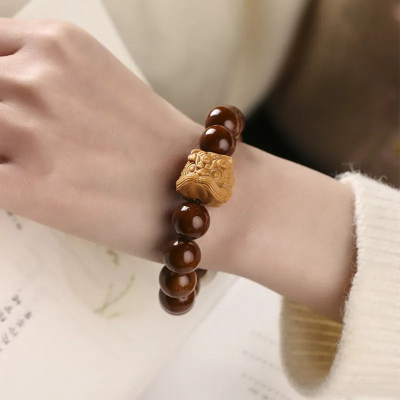 Hand-woven ivory nut lion round beads bracelet with 13mm beads and retro national style design