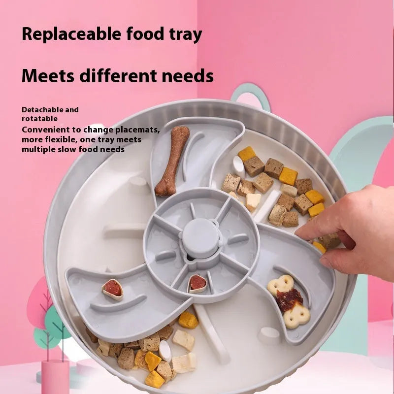 Slow feeder dog bowl with rotating game board and textured silicone licking mat insert.
