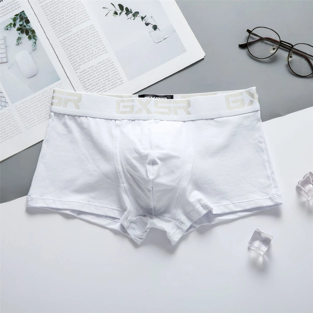Men's purified cotton low waist boxers in solid colour available in black white and grey