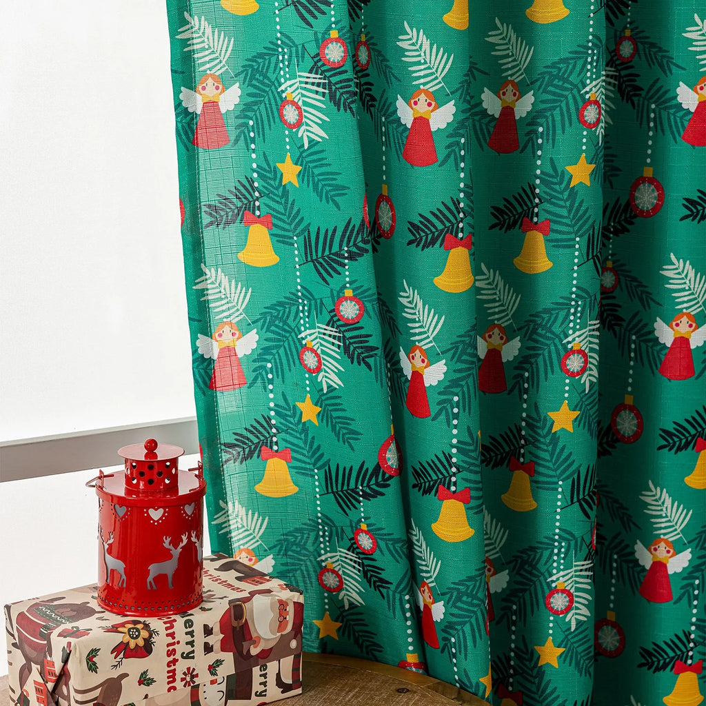 Christmas curtain with snowman and angel cartoon print in green colour, 1 metre length