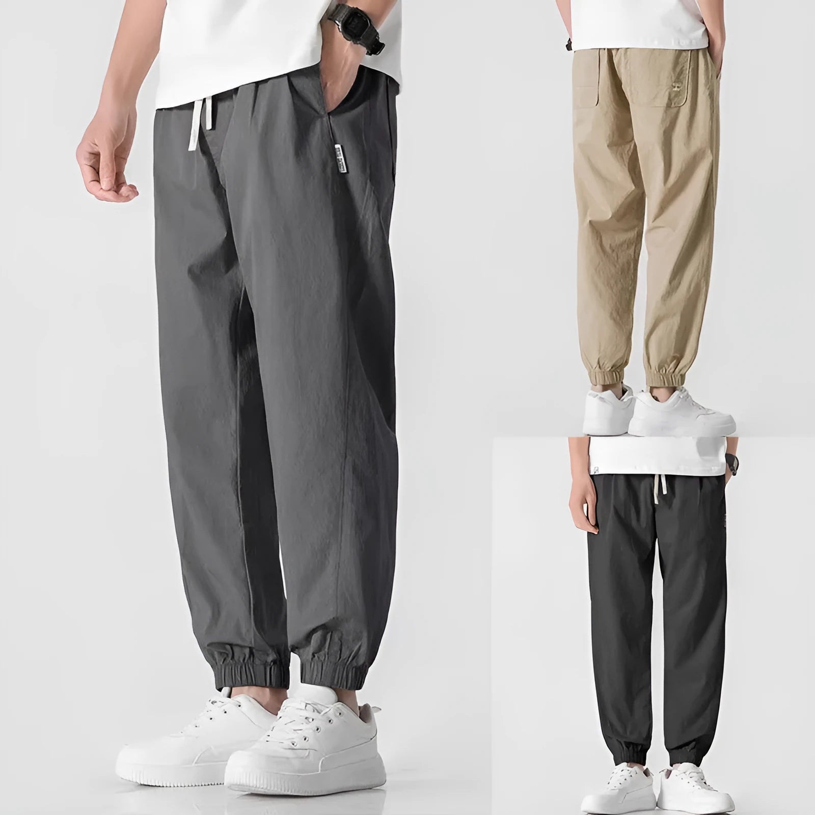 Men's loose cuffed cargo pants in black polyester fabric with cuffed hem and relaxed fit