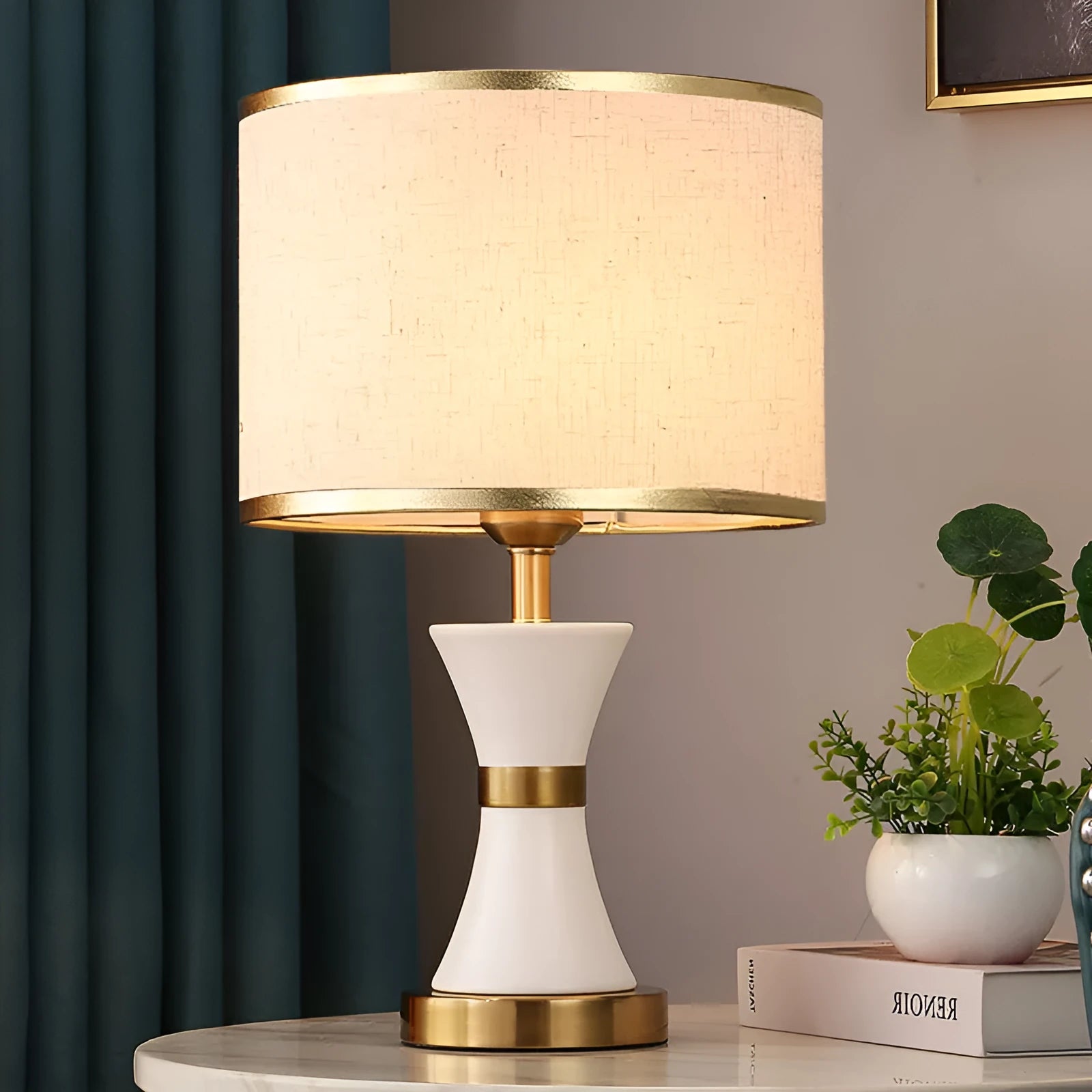 Black, gold, or white bedside table lamp with a fabric shade and iron base