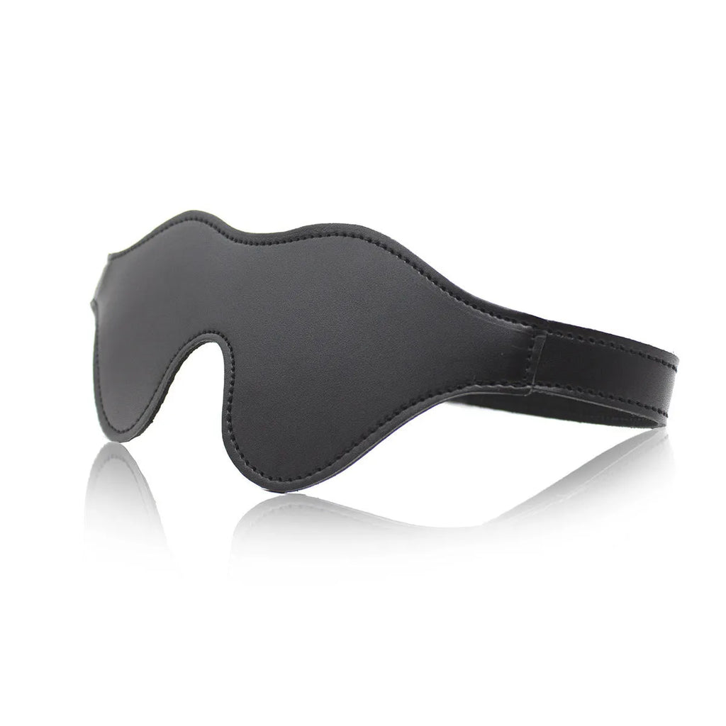 Women's black PU leather three-dimensional eye mask with Velcro strap and metal buckle closure.