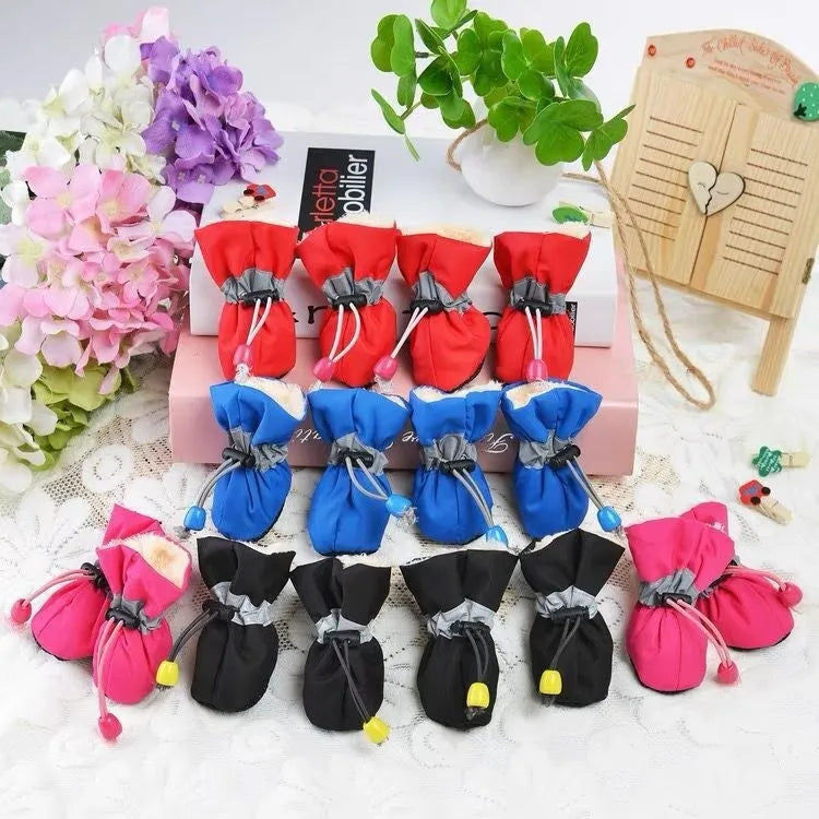 Breathable cloth dog shoes with soft soles available in multiple colours and seven size options