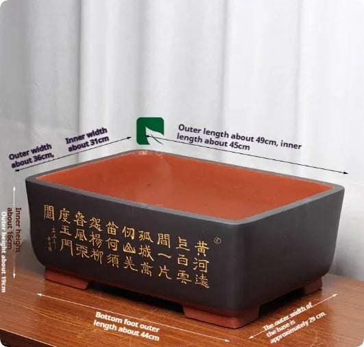 Purple clay Chinese style flower pot with plant on desktop, available in multiple colours and sizes