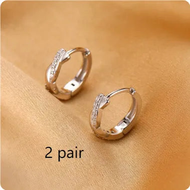 Geometric round copper earclip earrings with hemp rope interwoven design in gold colour