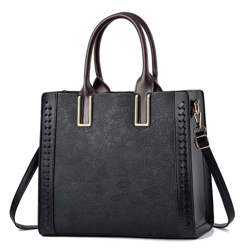 Ladies PU leather crossbody satchel bag with adjustable strap in black, horizontal square shape, soft finish