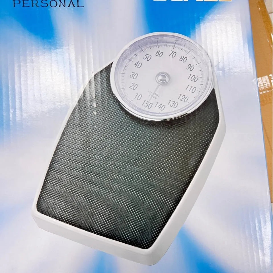 Large dial mechanical pointer body weight scale in black, 47x35x11cm, on bathroom floor