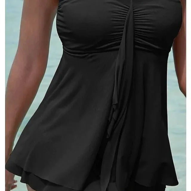 Women's strapless solid colour one-piece swimsuit dress in polyester fabric on a mannequin