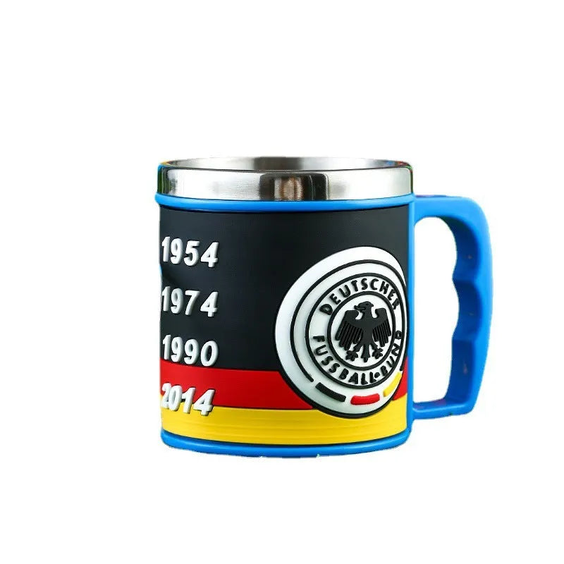 World Cup soccer mug souvenir in team colours, rubber and metal construction, 7.6cm diameter