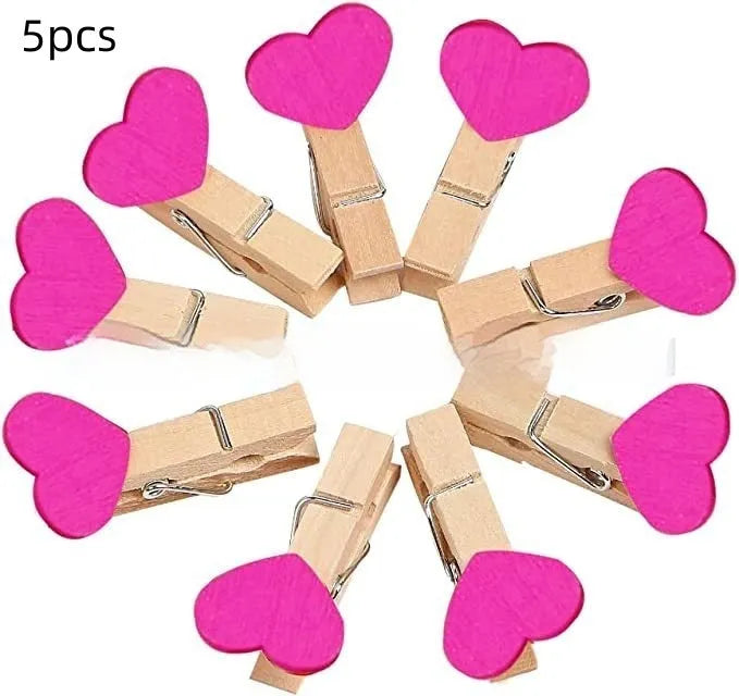 Set of five heart-shaped wooden hair clips in red, pink, white, and yellow colours.