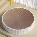 Green round cat scratching nest with corrugated paper surface, 55 cm diameter, shown with two replacement refill packs.