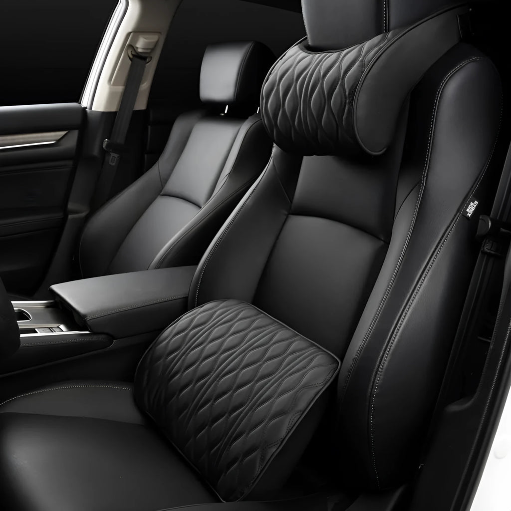 Memory foam car headrest and waist rest set in black leather and knitted fabric on a car seat