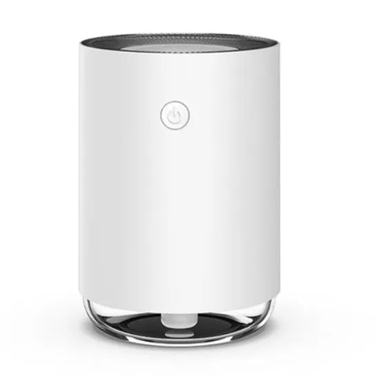 Green night light humidifier diffuser with coloured LED illumination and mist output