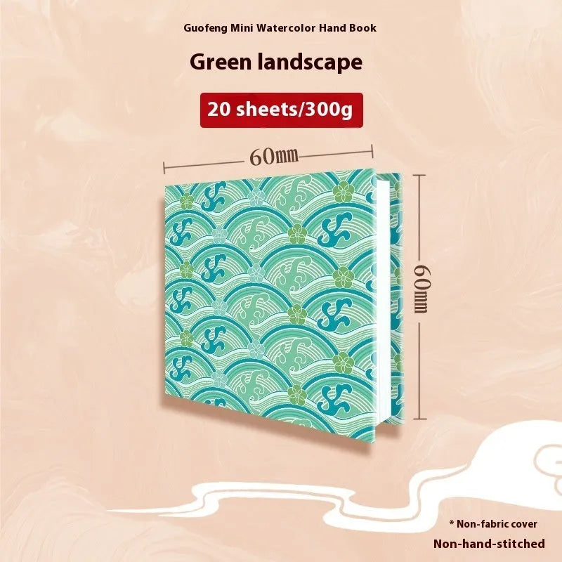 Feiluniao handmade fabric watercolour notebook with illustrated cover, open to show blank paper pages.