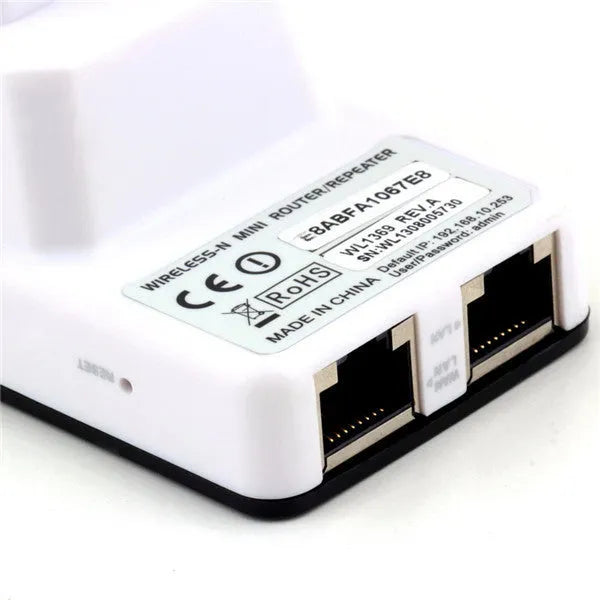 300Mbps mini wireless router with compact design showing WPS button and LAN ports