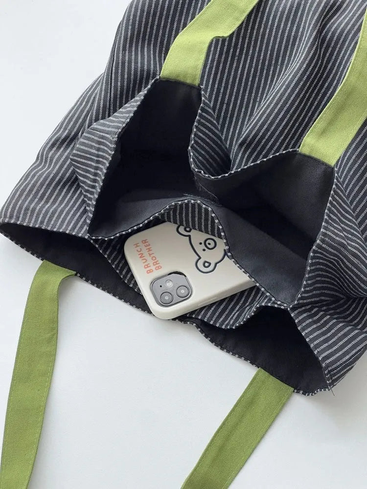 Canvas tote shoulder bag in plaid or striped design with multi-layer compartments