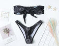 Black printed one-piece swimsuit with split tube top backless design