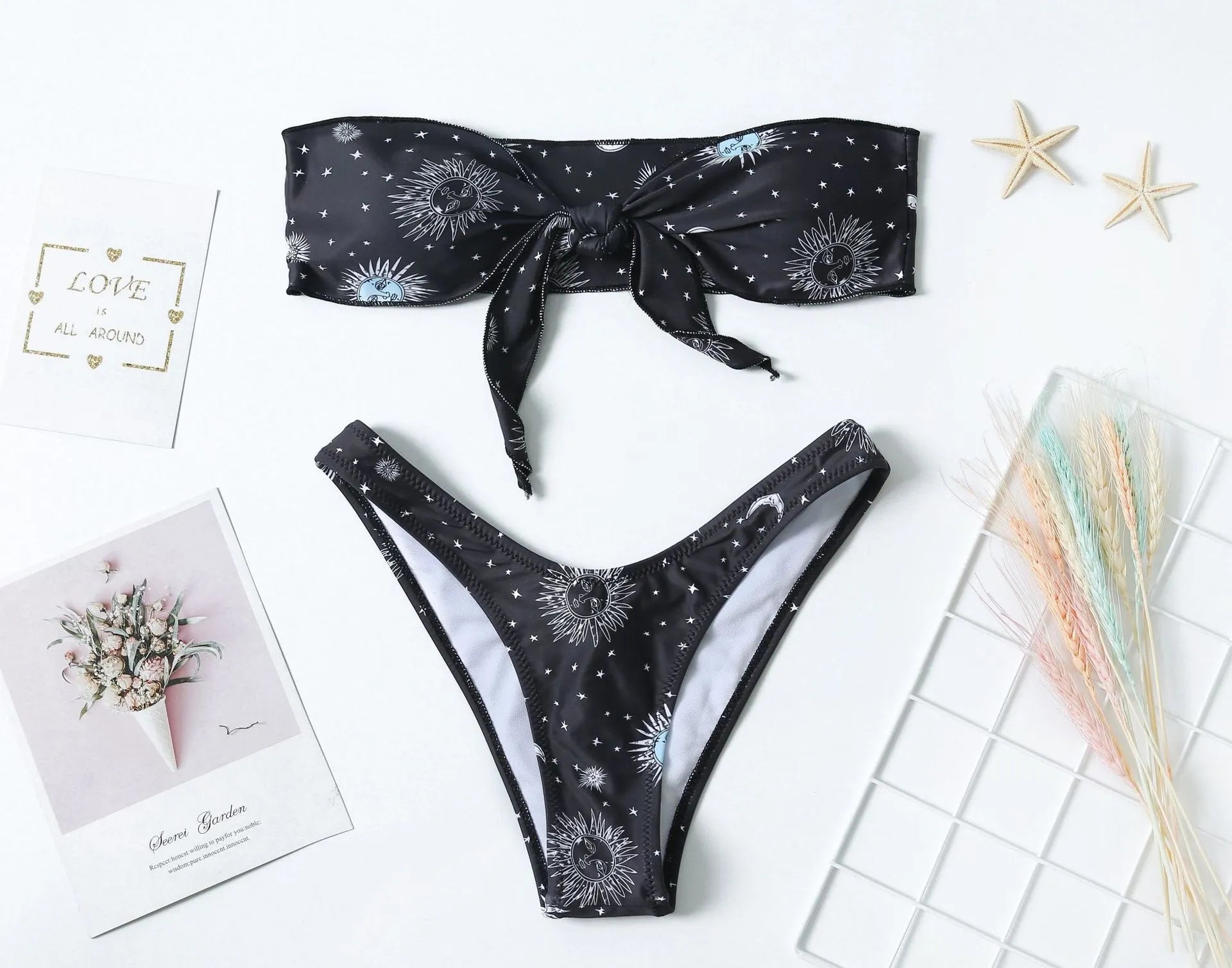 Black printed one-piece swimsuit with split tube top backless design