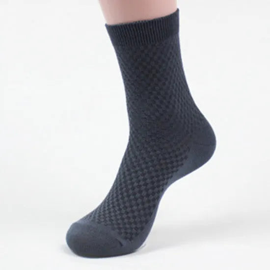 Men's bamboo fibre socks in a small square pattern, shown in navy blue colour.