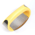 Stainless steel garlic masher press with ergonomic handle and non-slip grip