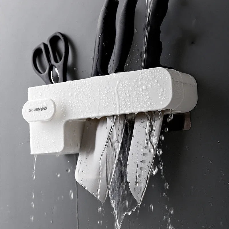 White plastic wall-mounted kitchen knife rack for utensil storage