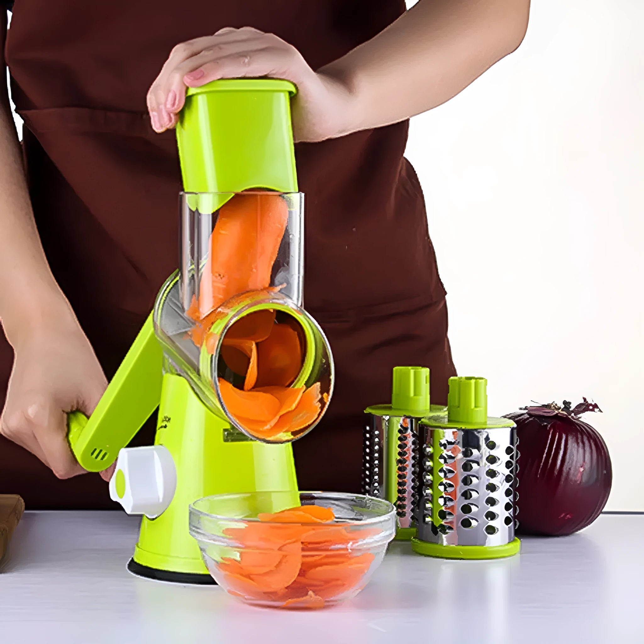 Round mandoline vegetable slicer with three stainless steel blades and suction cup base