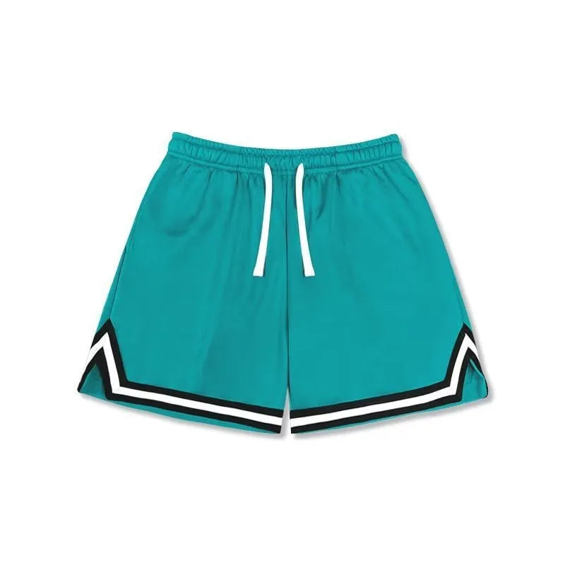 Man wearing loose-fit black polyester sports shorts for summer leisure activities.