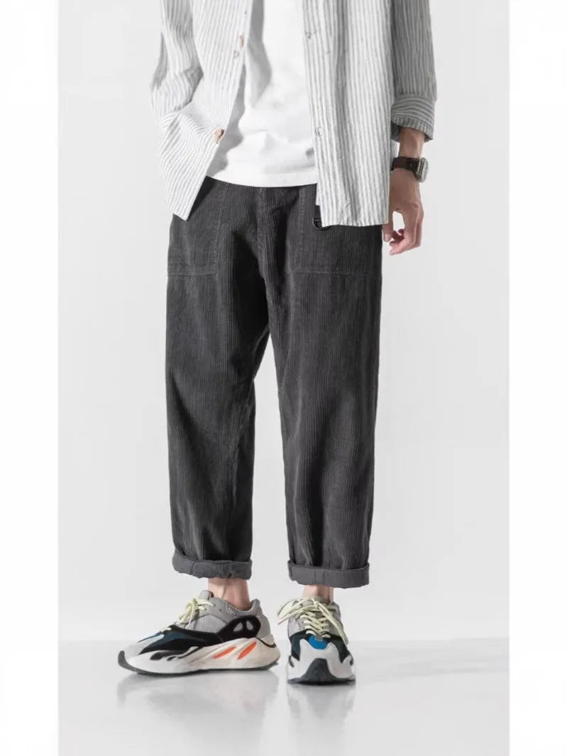 Loose straight tapered trousers in chemical fibre blend fabric, available in multiple sizes and colours