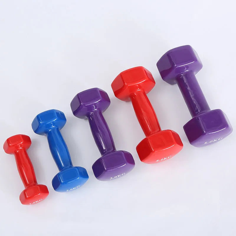 Bright colour plastic-coated fitness dumbbells in 0.5kg, 1kg, and 1.5kg weights for home workouts