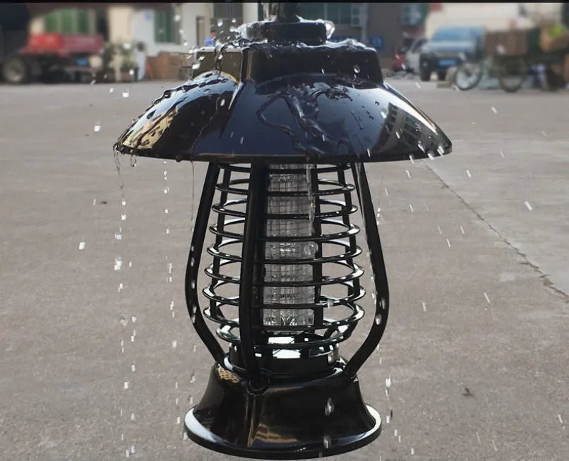 Black solar powered mosquito lamp with solar panel and LED lights for outdoor insect control
