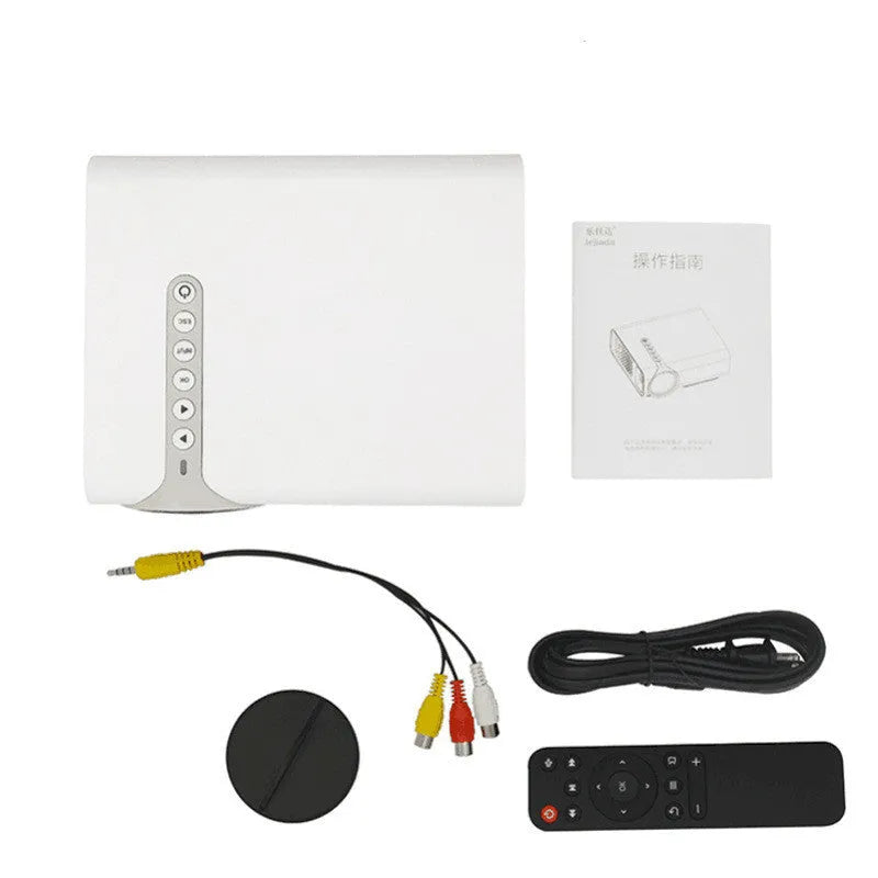 Portable HD 1080P projector in black with remote control and power cord on a table
