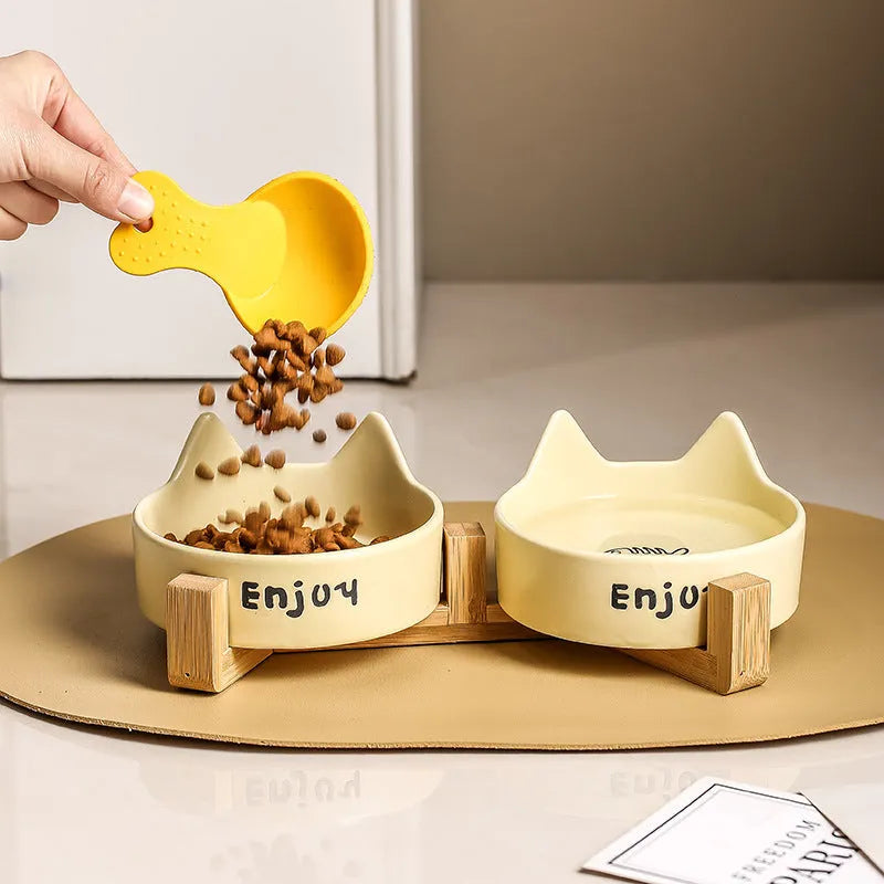 Porcelain cat bowl with wooden anti-tumble frame in chosen colour with cat ear design