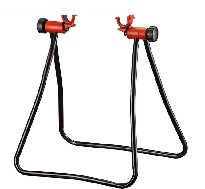 Foldable aluminium alloy bicycle repair rack in black with 3-way micro-adjustment and chain stay mounts on a flat surface