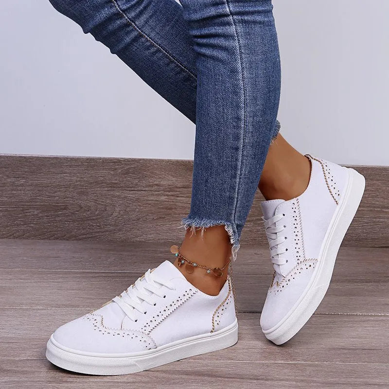 Women's canvas round toe slip-on flat shoes in solid colour with rubber sole, low top design