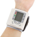 Grey portable wrist blood pressure monitor with compact 70mm width design