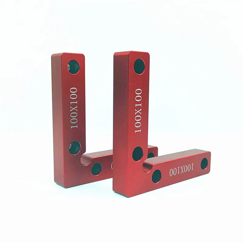 Aluminium alloy right angle positioning block for woodworking jigsaws with measurement scale.