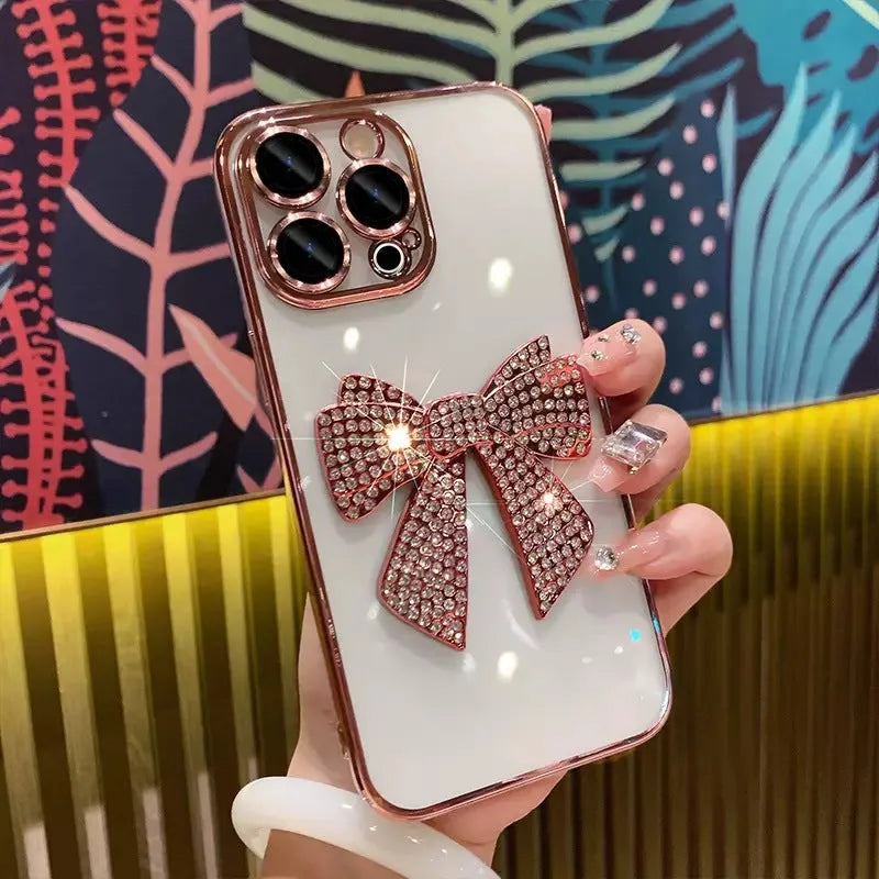 Electroplating diamond bow phone case with lens protector for iPhone in pink and silver TPU finish