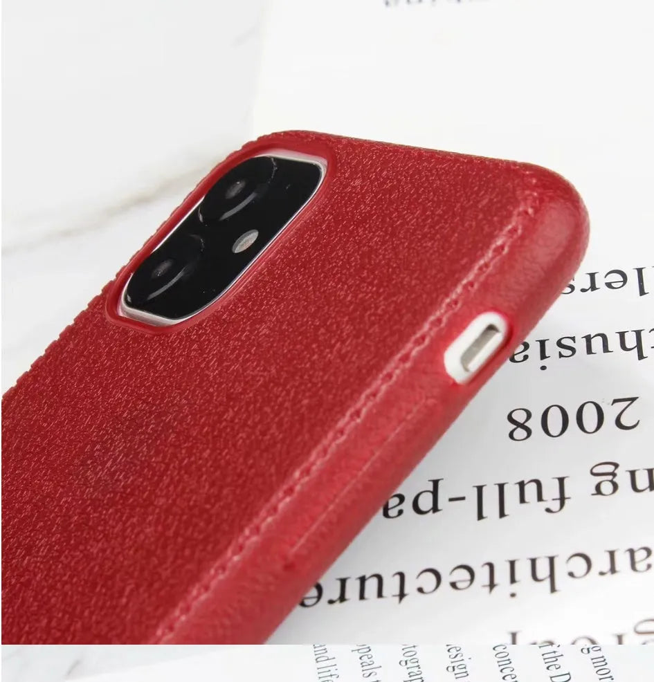 Genuine leather iPhone case with TPU bumper in Black, Brown, Navy Blue, and Wine Red colours for multiple models.