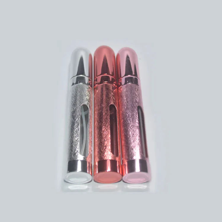 12ml aluminium portable perfume bottle in bullet shape with choice of six colours: blue, pink, red, violet, gold, silver.